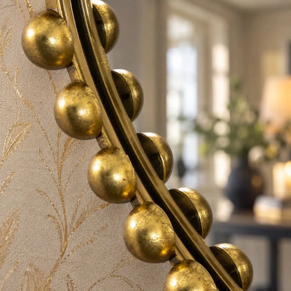 Large Gold Bobbin Wall Mirror with Raised Bobbin Frame – Oval Racetrack Pill Shaped Decorative Mirror 90x61x5cm – Close-Up of Textured Gold Bobbin Frame with Subtle Gold Wallpaper | Click Style