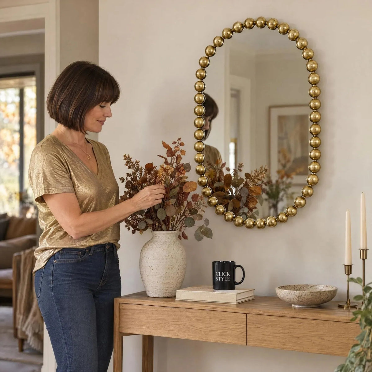 Large Gold Bobbin Wall Mirror with Raised Bobbin Frame – Oval Racetrack Pill Shaped Decorative Mirror 90x61x5cm – Woman Styling Autumnal Foliage Above Oak Console Table | Click Style