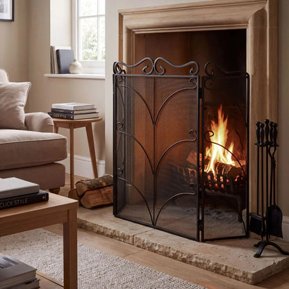 Large Ornate Black Metal Firescreen with Scrollwork – Decorative Fire Guard 75x85x2cm styled in a neutral living room with fireplace