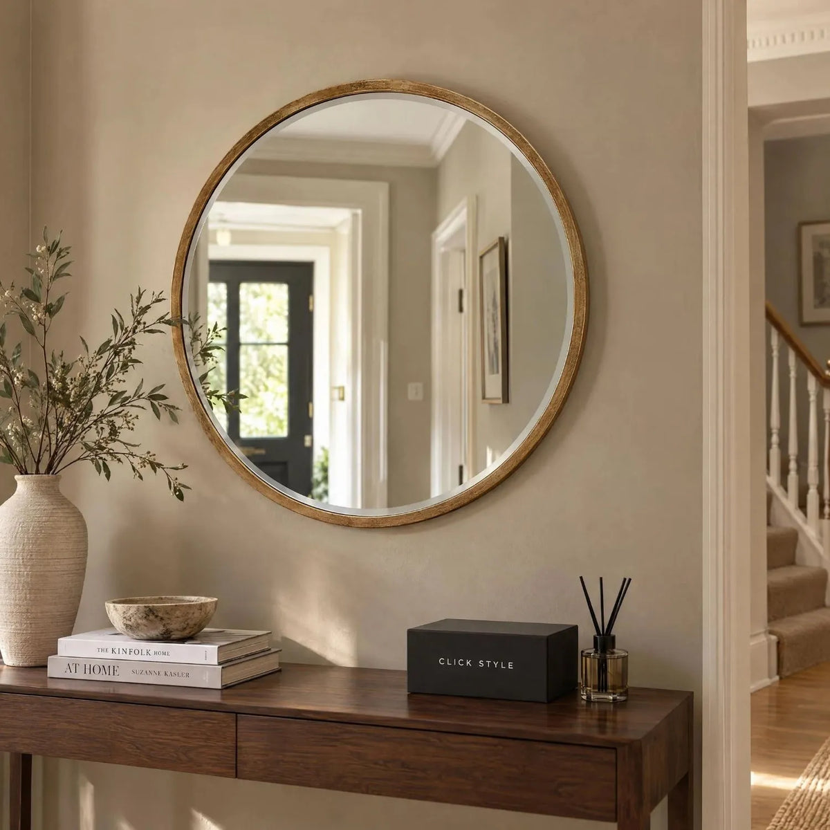 Large Round Antique Gold Wall Mirror with Slim Metal Frame & Bevelled Glass – Decorative Circular Mirror 80x2cm displayed above a dark walnut console table in an elegant hallway with CLICK STYLE branding | Click Style