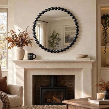Large Round Black Bobbin Wall Mirror with Raised Bobbin Frame – 80cm Decorative Statement Mirror 80x80x5cm – Styled Above Pale Stone Fireplace & Mantelpiece | Click Style