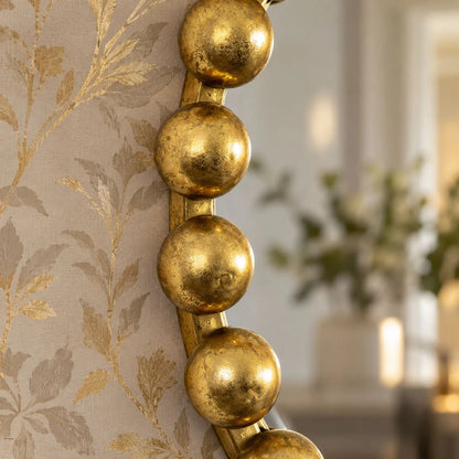 Large Round Gold Bobbin Wall Mirror with Raised Bobbin Frame – 80cm Decorative Statement Mirror 80x80x5cm – Close-Up of Textured Gold Bobbin Frame Against Botanical Wallpaper | Click Style