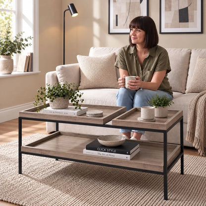 Natural Wood Effect Veneer 2 Shelf Coffee Table with Removable Trays & Black Metal Frame – lifestyle view with woman | Click Style