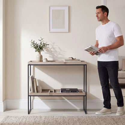 Natural Wood Effect Veneer 2 Shelf Display Unit with 3 Trays & Black Metal Frame styled in a contemporary home with man | Click Style