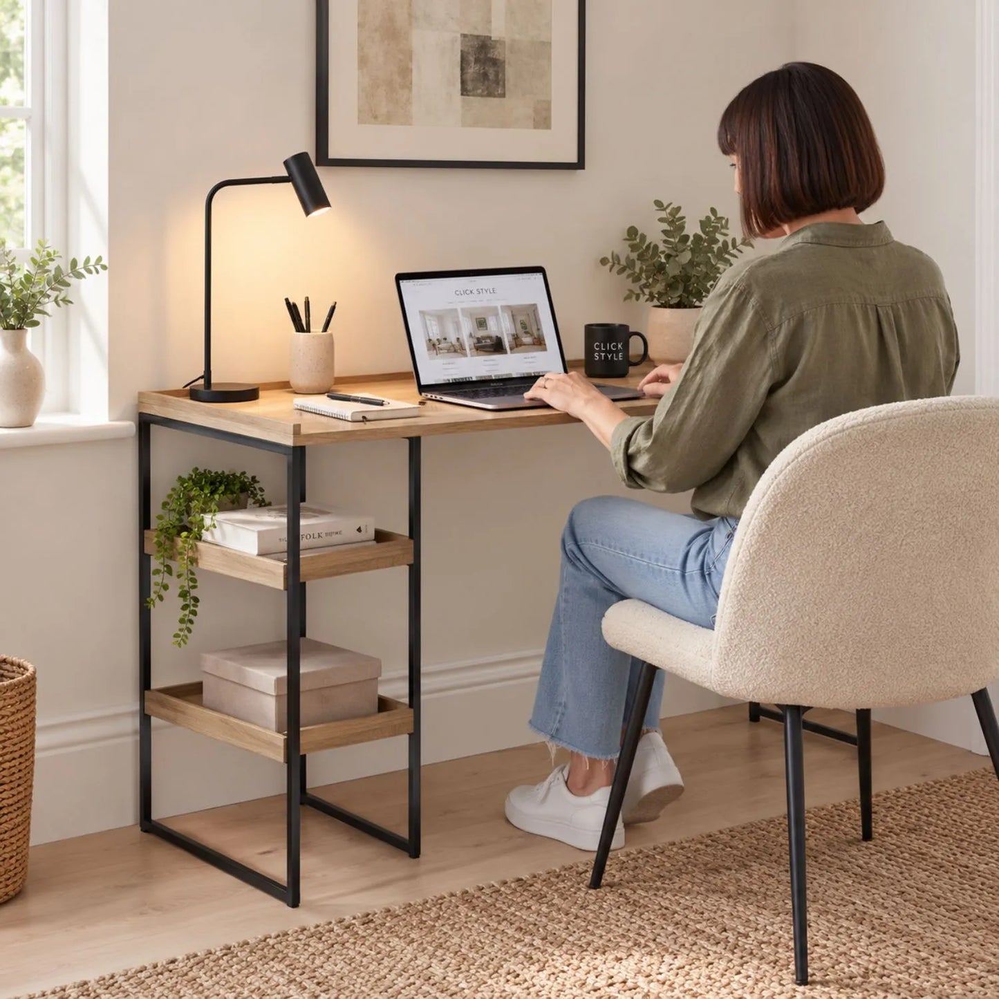 Natural Wood Effect Veneer Desk with 2 Storage Shelves & Black Metal Frame styled in a modern home office with woman working | Click Style