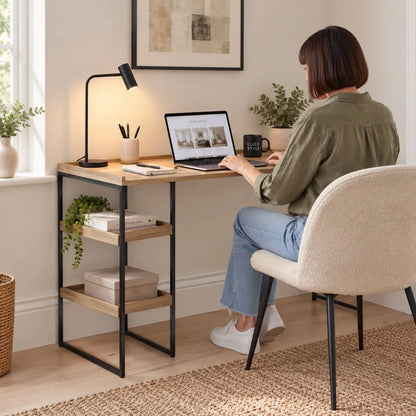 Natural Wood Effect Veneer Desk with 2 Storage Shelves & Black Metal Frame styled in a modern home office with woman working | Click Style