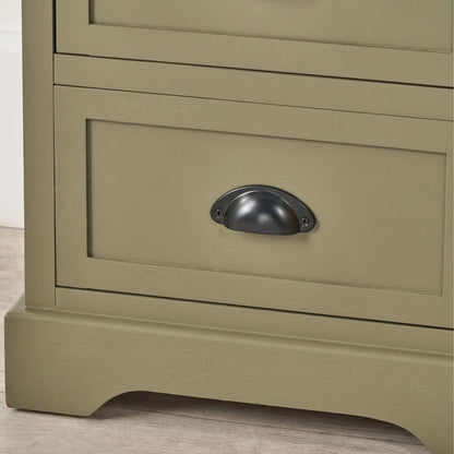 Olive Green Pine Wood 5 Drawer Tall Boy Chest of Drawers Lifestyle Close Up Showing Bottom Right Corner Plinth Base and Matt Black Cup Handle | Click Style