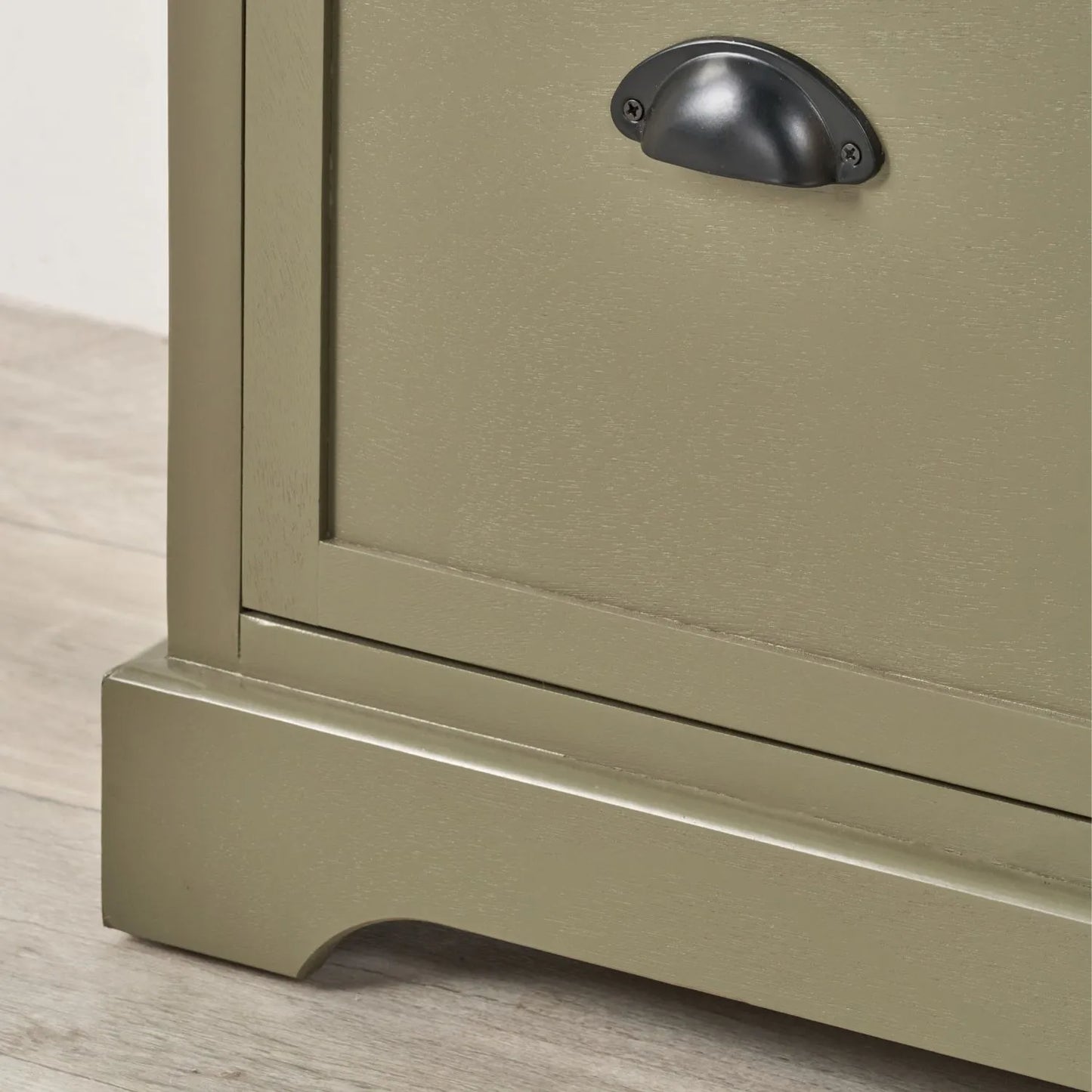 Olive Green Pine Wood Low 3 Drawer Storage Unit with Matt Black Cup Handles Close Up of Bottom Left Corner Showing Handle and Plinth Foot 48x107x39cm | Click Style