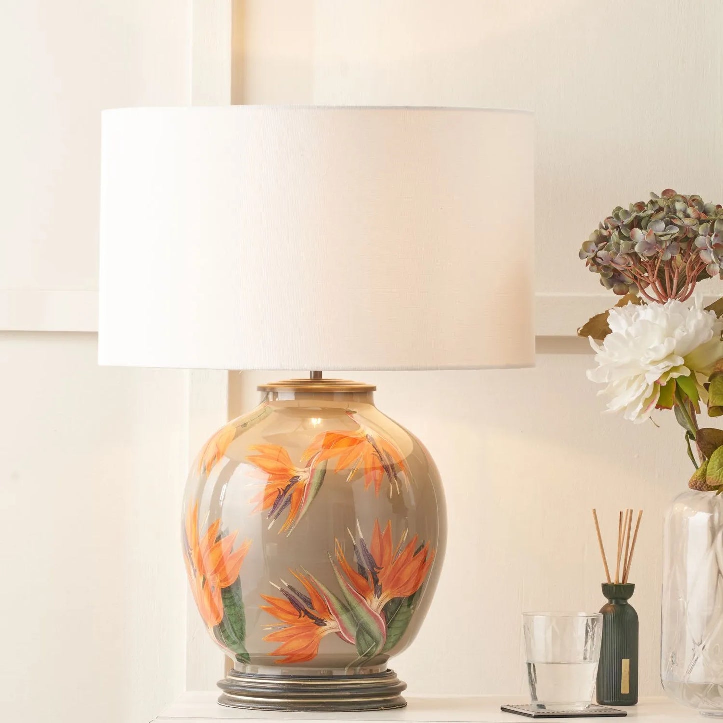 Jenny Worrall Orange & Purple Bird of Paradise & Foliage Beige Taupe & Champagne Gold Glass Table Lamp Base – Bulbous Shape & Antique Brass Collar – Handcrafted Luxury Floral Lighting 42x28x28cm | Click Style