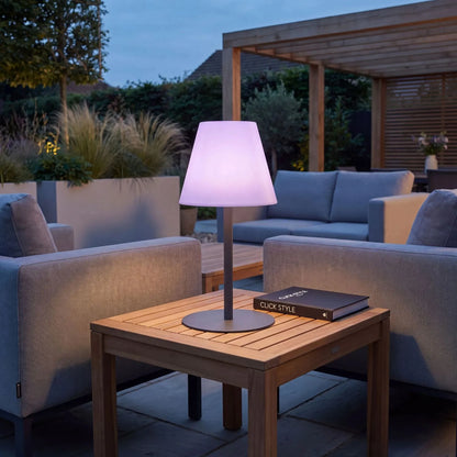 Outdoor Grey Rechargeable LED Table Lamp with Dimmable & Colour-Changing Settings – Weather-Resistant Garden Light 50x24x24cm in a garden lounge setting in lilac light mode | Click Style