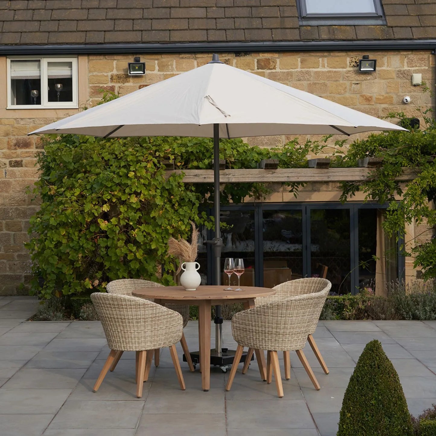Platinum Riva 3.5m Round Centre Pole Parasol in Champagne with anthracite grey powder-coated aluminium centre pole, water-repellent canopy and easy wind-up handle for gardens, patios, terraces and balconies | Click Style