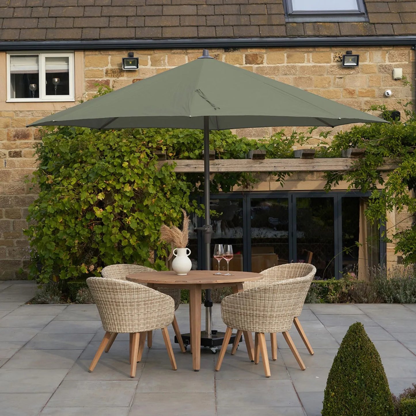 Platinum Riva 3.5m Round Centre Pole Parasol in Olive Green with anthracite grey powder-coated aluminium frame, durable water-repellent canopy and easy wind-up crank handle for patios, terraces and outdoor dining | Click Style