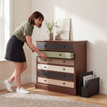 Sage Green & Neutral Pine Wood 6 Drawer Chest with Black Knob Handles styled in a neutral interior with woman | Click Style