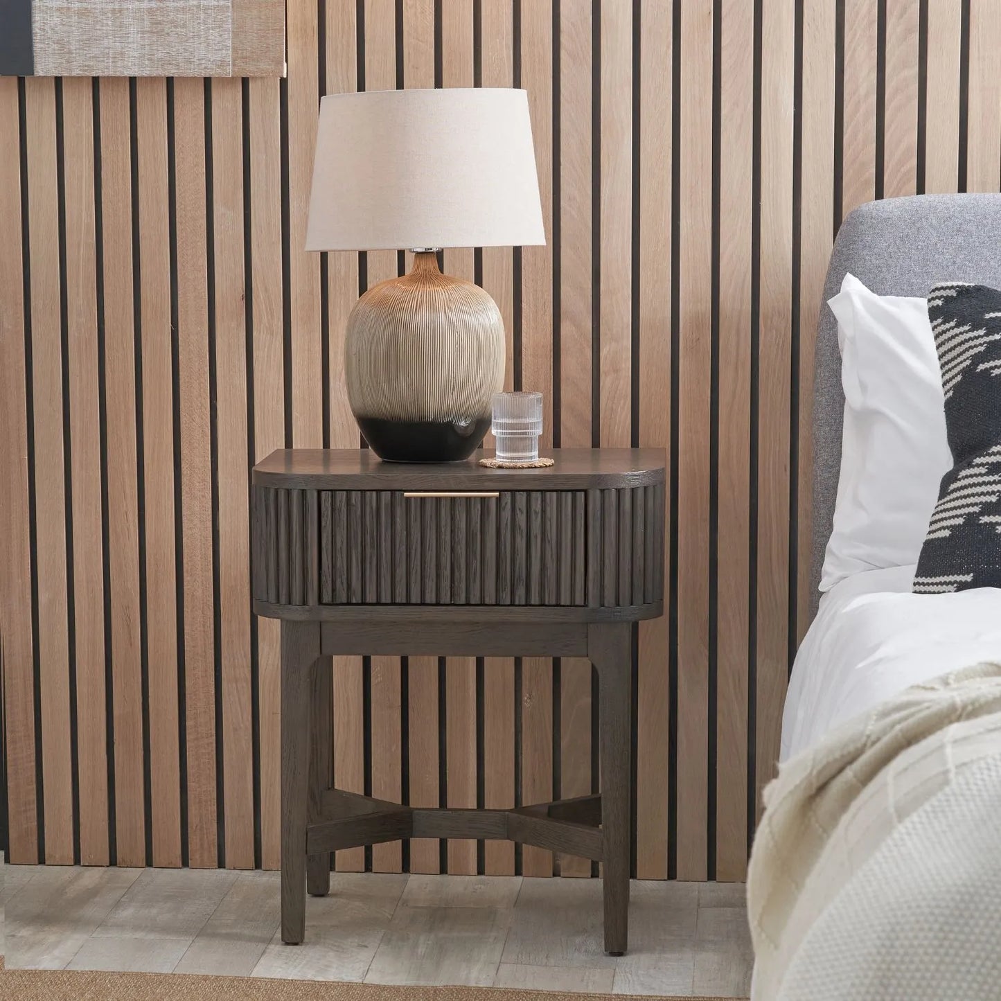 Scandinavian Retro Ribbed Dark Brown Oak Wood 1 Drawer Wooden Side Table with Slim Gold Handle, Curved Edges, Tapered Legs and Angular Cross Brace – Bedside Table 65x56x38cm | Click Style