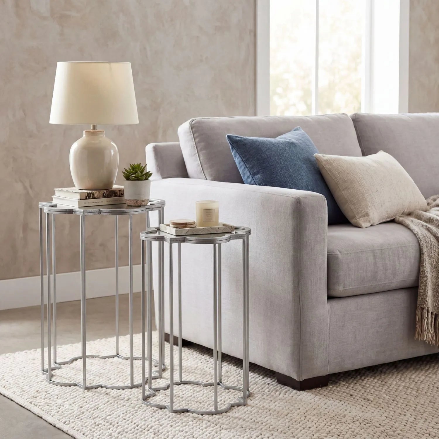 Set of 2 Silver Mirrored Quatrefoil Nesting Side Tables with Handcrafted Metal Frames, Bevelled Mirrored Tops and Geometric Openwork Design – Modern Occasional Lamp Tables for Living Room, Bedroom or Hallway H69xW19xD19cm & H62xW16xD16cm | Click Style