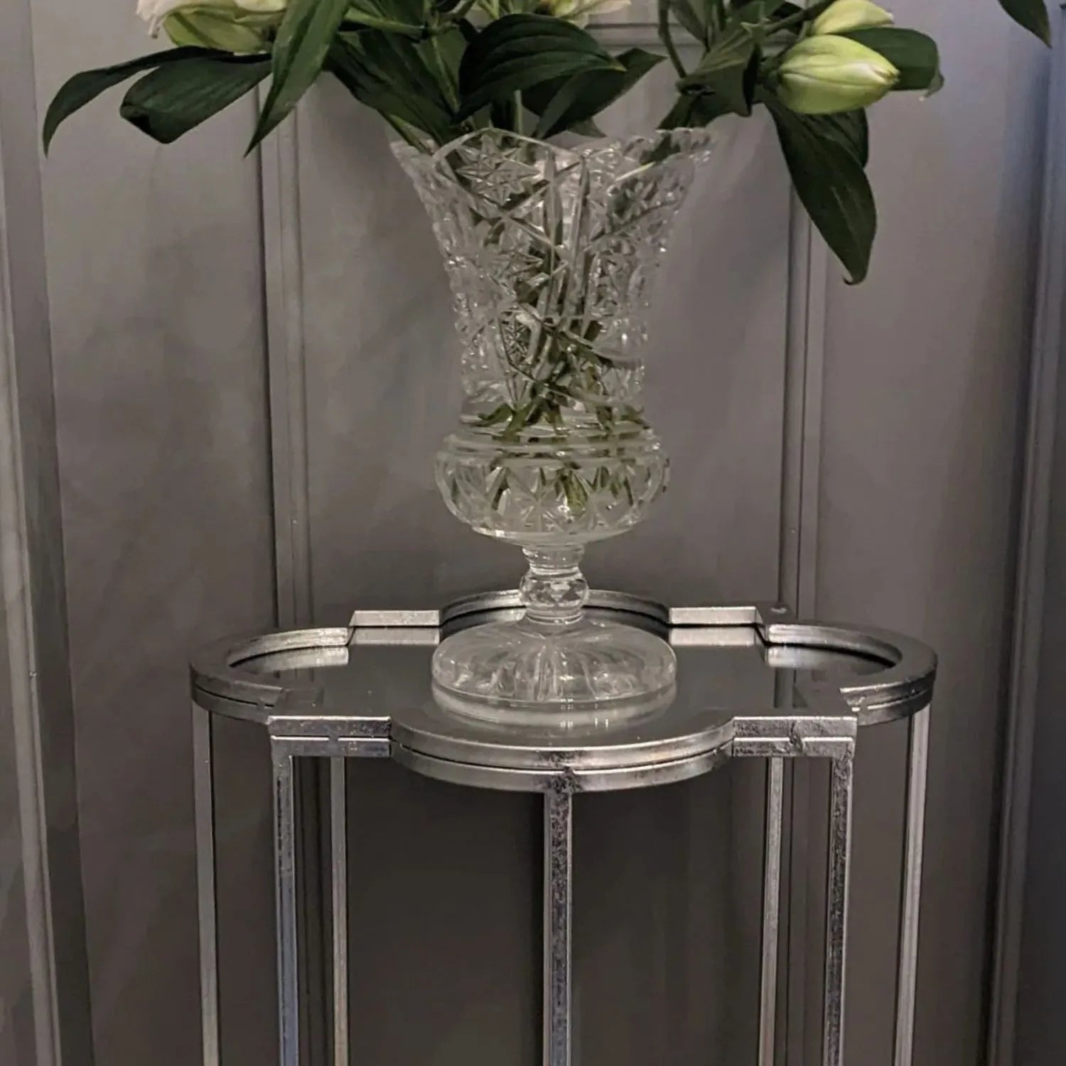 Set of 2 Silver Mirrored Quatrefoil Nesting Side Tables with Handcrafted Metal Frames, Bevelled Mirrored Tops and Geometric Openwork Design – Modern Occasional Lamp Tables for Living Room, Bedroom or Hallway H69xW19xD19cm & H62xW16xD16cm | Click Style