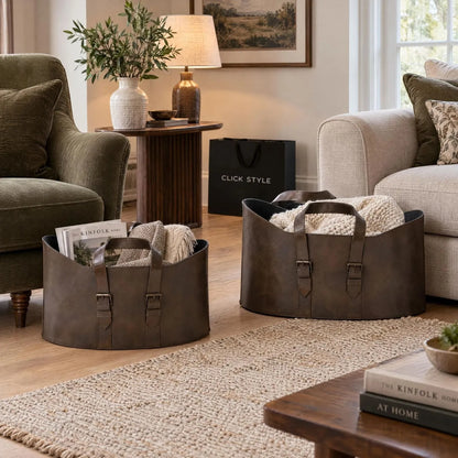 Set of Two Dark Brown Leather Storage Baskets with Carry Handles & Buckle Straps – Sculptural Storage Bins 34x50x40cm Styled Beside Sofa & Armchair with Throws & Magazines | Click Style