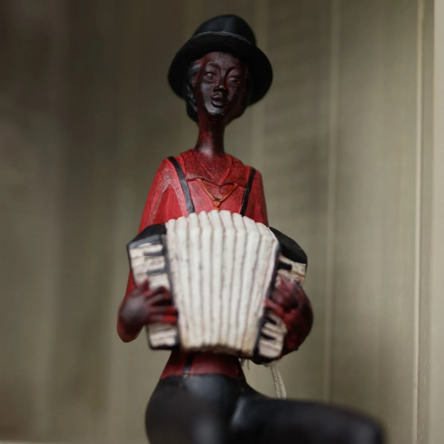 Shelf-Sitter Jazz Accordionist Ornament with Brown Trousers Hat Red Shirt & Yellow Tie with Black Braces – Sitting Musician Sculpture 40x12x10cm - Click Style