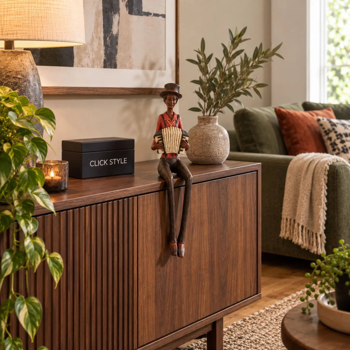 Shelf-Sitter Jazz Accordionist Resin Ornament – Sitting Musician Sculpture 40x12x10cm Styled on Walnut Sideboard in Contemporary Living Room | Click Style