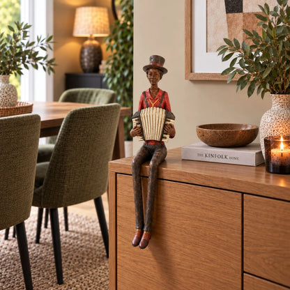 Shelf-Sitter Jazz Accordionist Resin Ornament – Sitting Musician Sculpture 40x12x10cm Styled on Natural Wood Sideboard in Contemporary Dining Room | Click Style