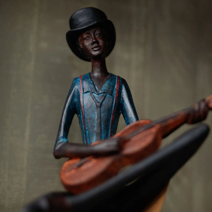 Shelf-Sitter Jazz Guitarist Ornament with Brown Trousers Hat Blue Shirt Brown Tie & Red Braces – Sitting Musician Sculpture 42x17x11cm - Click Style