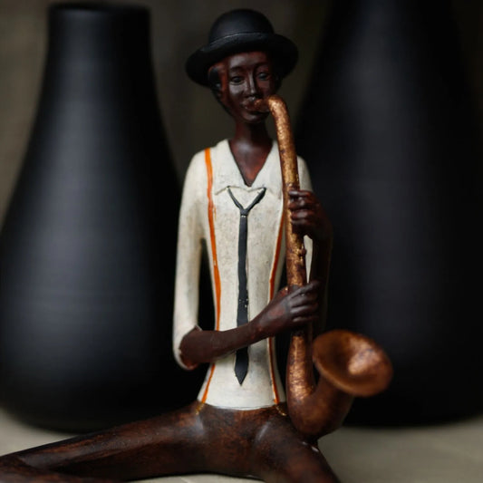 Shelf-Sitter Jazz Saxophonist Ornament with Brown Trousers Hat Cream Shirt Black Tie & Orange Braces – Sitting Musician Sculpture 38x17x11cm - Click Style