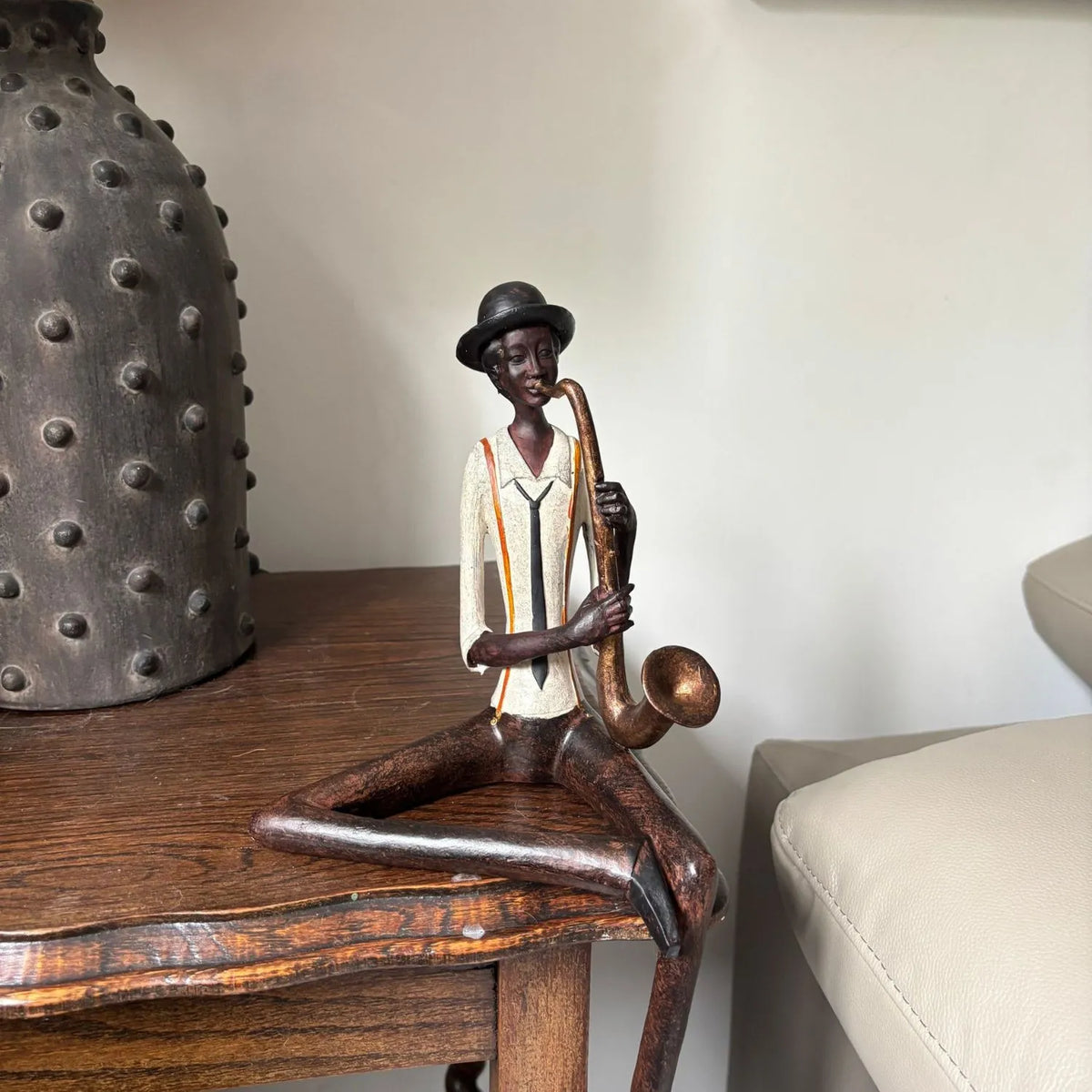 Shelf-Sitter Jazz Saxophonist Resin Ornament close-up in real customer's home | Click Style