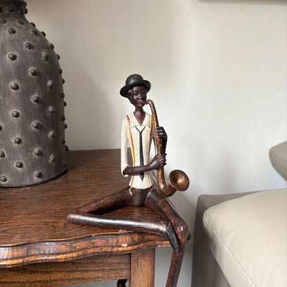 Shelf-Sitter Jazz Saxophonist Resin Ornament close-up in real customer's home | Click Style