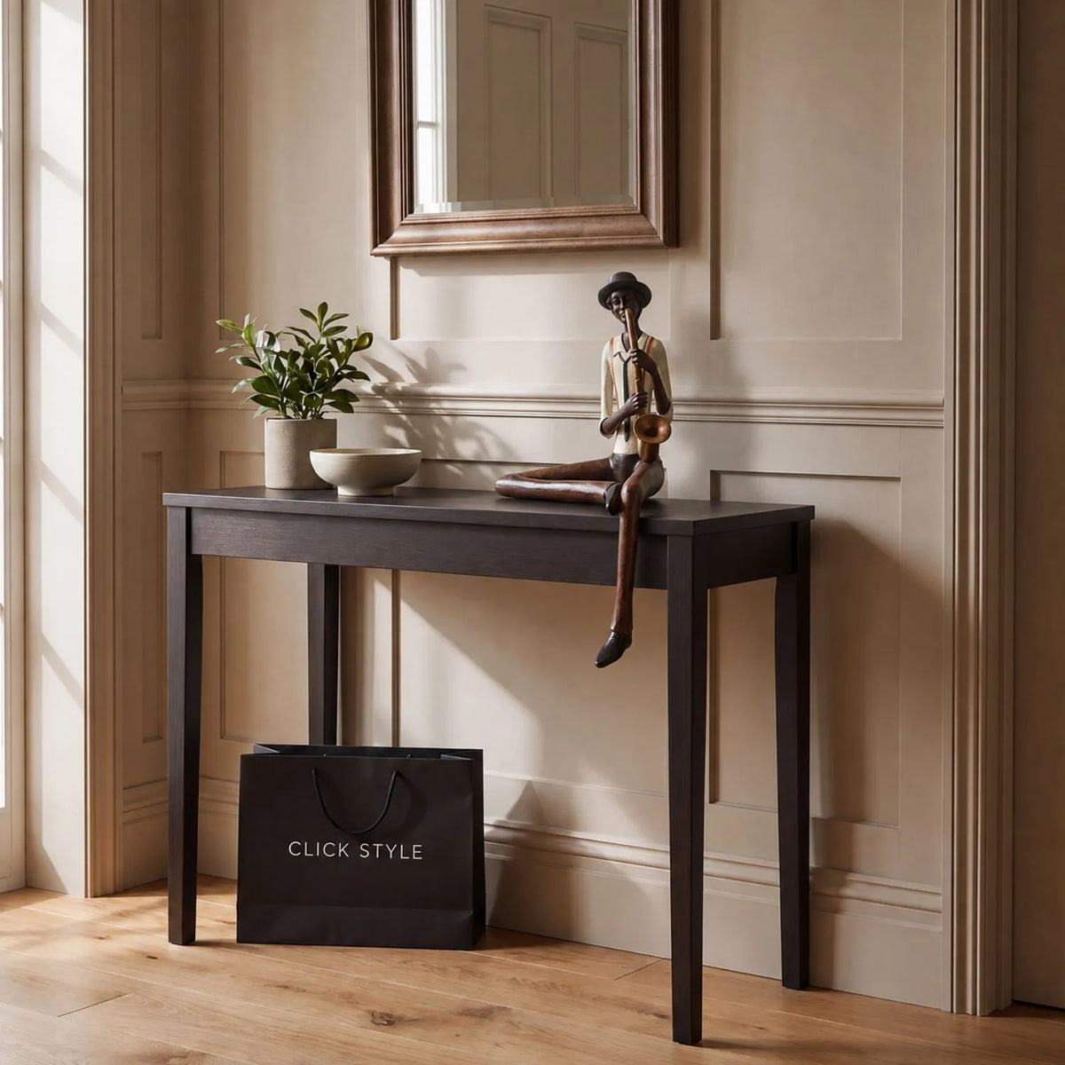 Shelf-Sitter Jazz Saxophonist Resin Ornament styled on a dark wood console table in a warm neutral hallway | Click Style