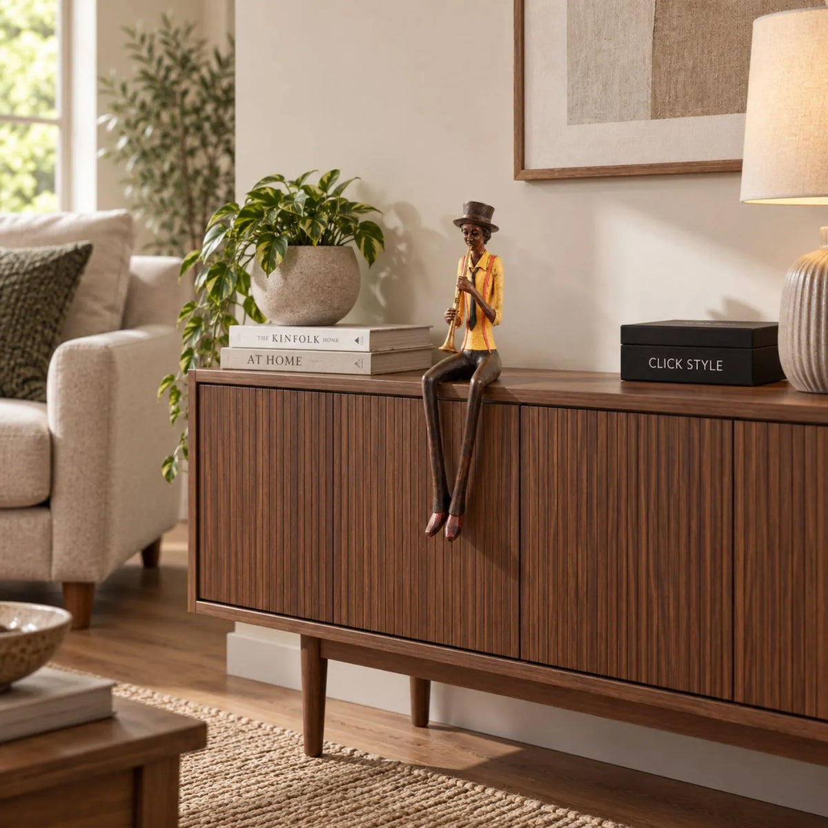 Shelf-Sitter Jazz Trumpeter Resin Ornament – Sitting Musician Sculpture Styled on Dark Walnut Sideboard in Contemporary Living Room 39x12x10cm | Click Style