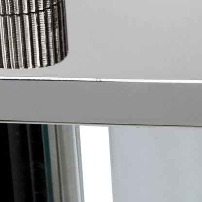 Silver Metal & Glass Table Mantel Clock with Floating Clock Face Roman Numerals & Black Hands 28x25x7cm close-up of ribbed top corner detail and polished silver frame | Click Style