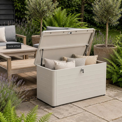 Small Light Grey Pebble Galvanised Steel Outdoor Cushion Storage Box with open lid full of garden cushions styled in a contemporary garden with Click Style branding | Click Style