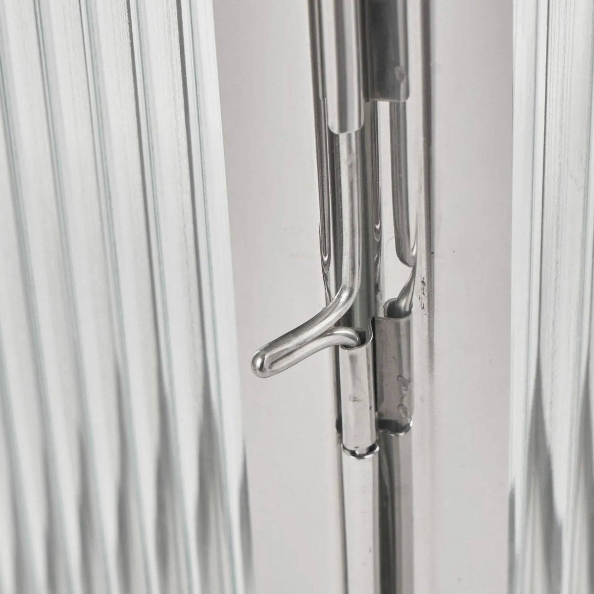 Small Polished Silver Nickel Candle Lantern with Ribbed Glass Panels & Curved Carry Handle – Decorative Stainless Steel Lantern 43x19x17cm – Close-up of polished silver door fastening and vertical ribbed glass | Click Style