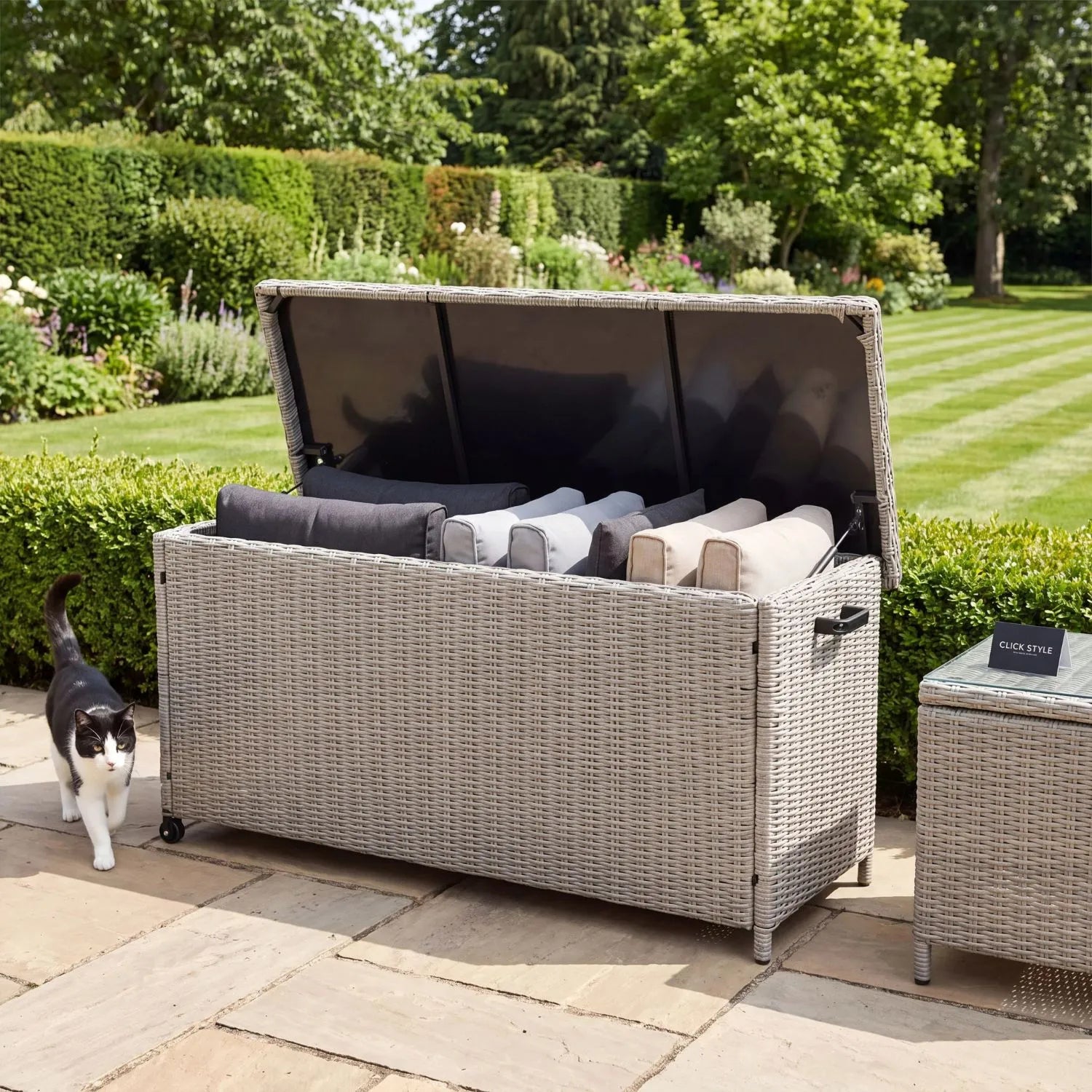 Small Stone Grey Rattan Effect 460L Weatherproof Outdoor Garden Cushion Storage Box with Wheels and Gas-Assisted Lid for Garden Furniture Cushions | Click Style