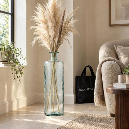 Tall Clear Recycled Glass Bottle Vase with Narrow Neck – Large Decorative Floor Standing Vase 75x25x25cm – Styled with Natural Pampas Grass in a Warm Neutral Living Room | Click Style