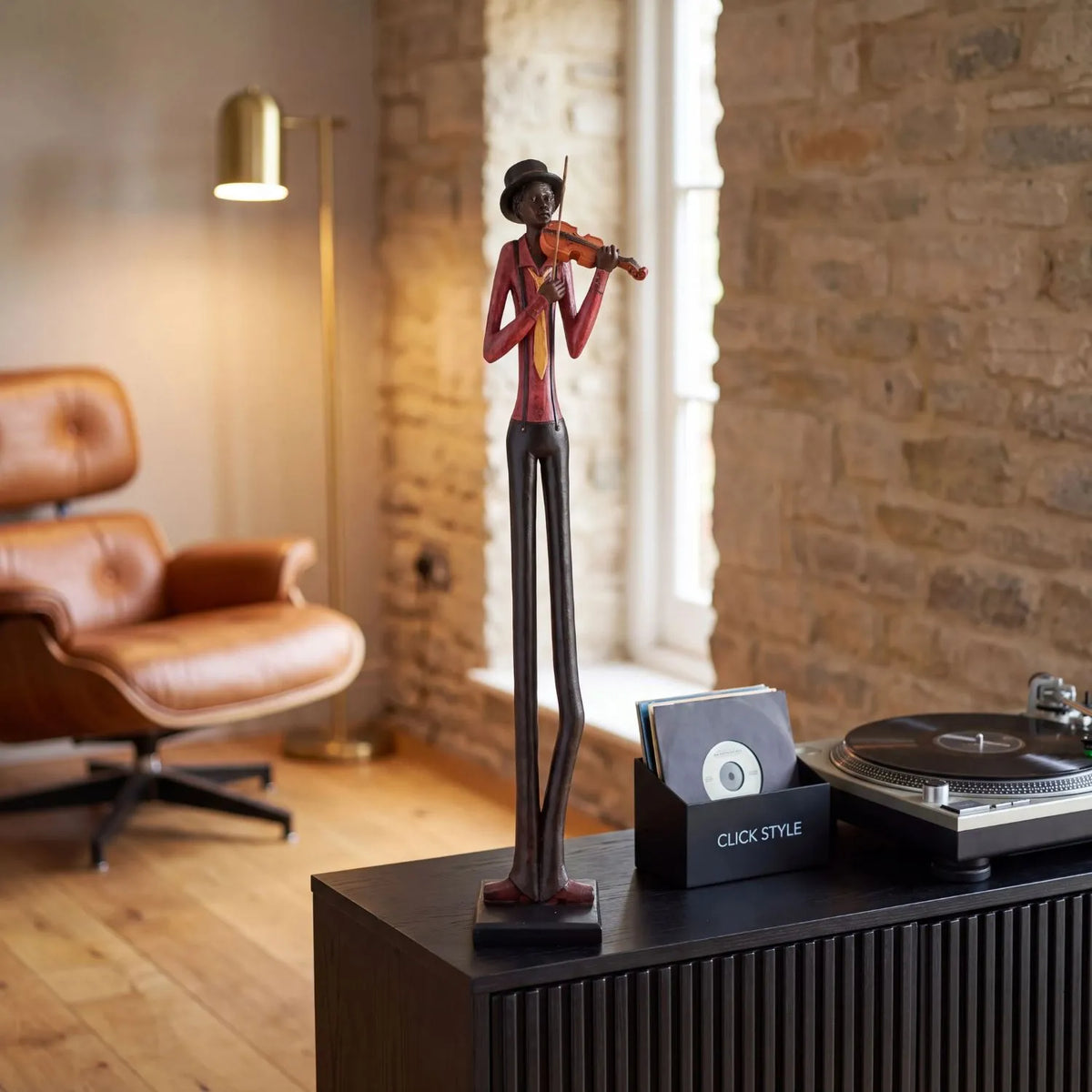Tall Floor-Standing Jazz Violinist Resin Ornament – Standing Musician Sculpture 60x10x10cm styled on a black ribbed sideboard with a record player in a contemporary listening room | Click Style