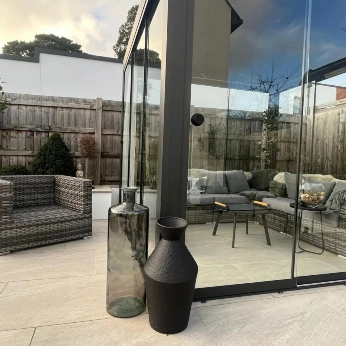 Tall Grey Recycled Glass Bottle Vase with Narrow Neck – Large Decorative Floor Standing Vase 75x25x25cm – Real Customer Photo Displayed Beside a Garden Room | Click Style