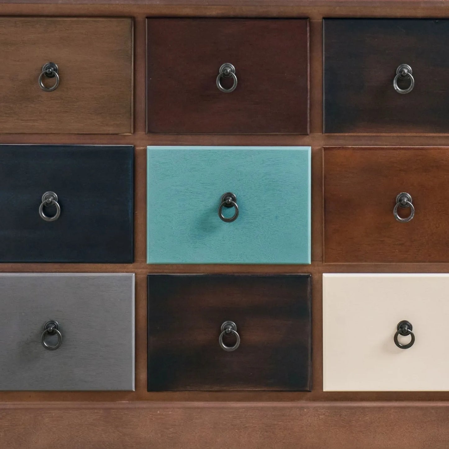 Turquoise blue and neutral distressed pine wood 12 drawer storage chest close-up showing nine drawers and black ring handles | Click Style