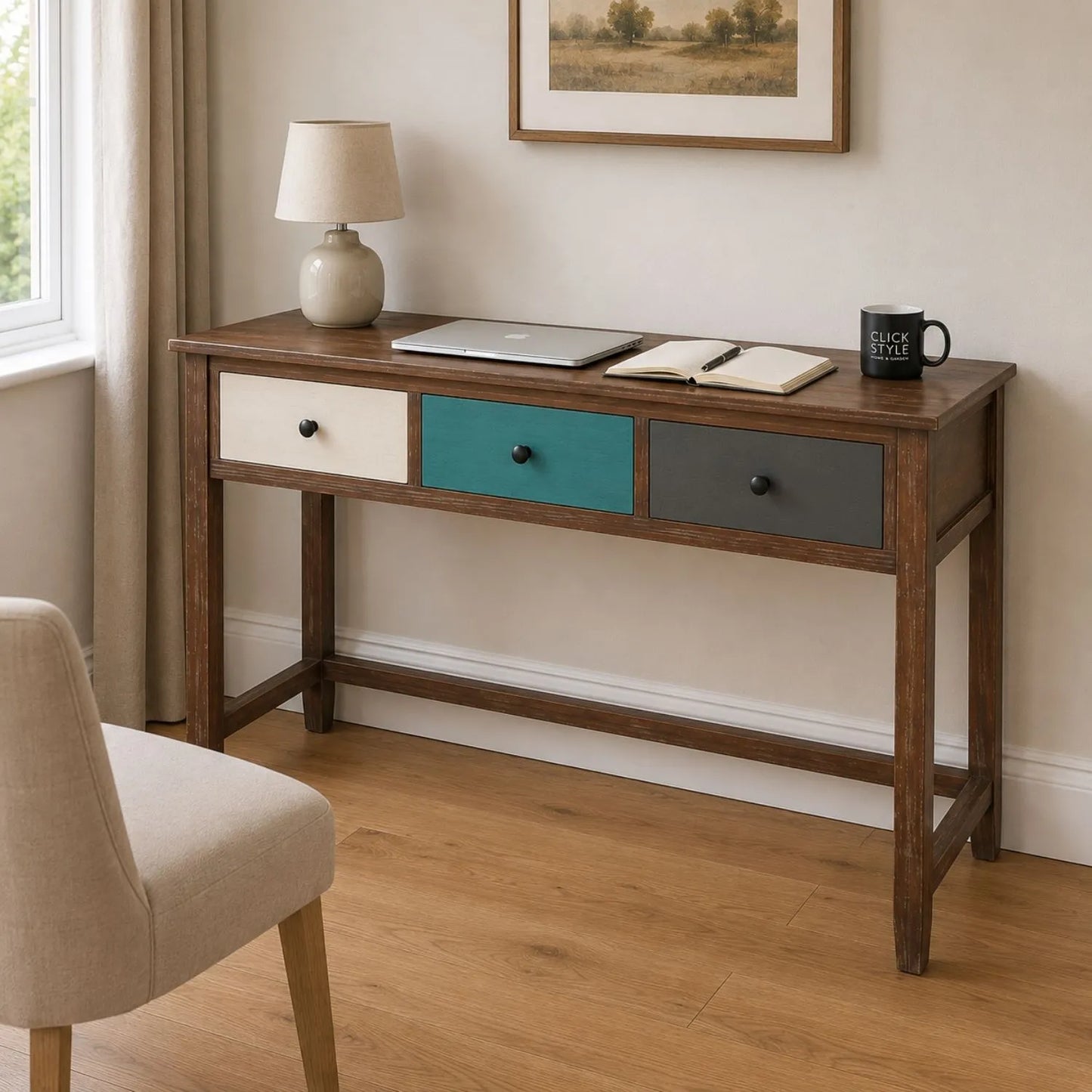 Turquoise blue and neutral distressed pine wood 3 drawer desk with black knob handles styled in a modern home office | Click Style