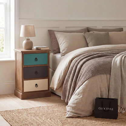 Turquoise blue and neutral distressed pine wood 3 drawer bedside table with black ring handles styled in a modern country bedroom | Click Style
