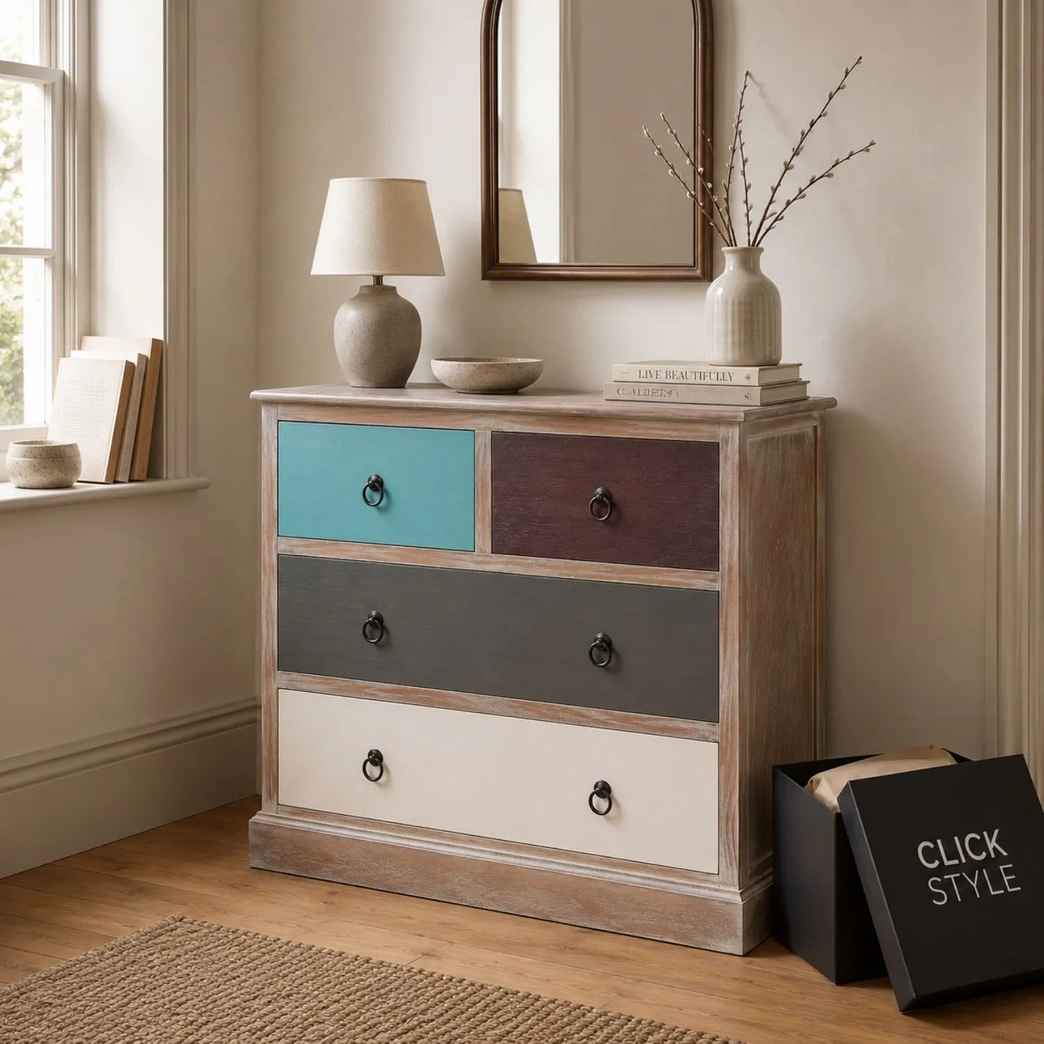 Turquoise Blue & Neutral Distressed Pine Wood 4 Drawer Chest with Black Ring Handles styled in a neutral hallway with arched mirror | Click Style