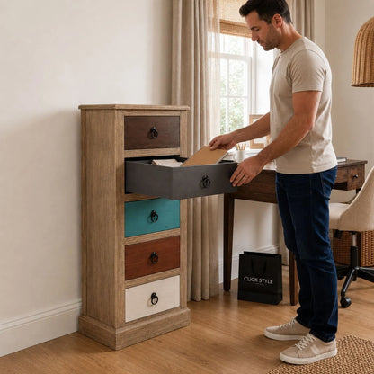 Turquoise blue and neutral distressed pine wood 5 drawer tallboy chest with black ring handles styled in a home office with man | Click Style