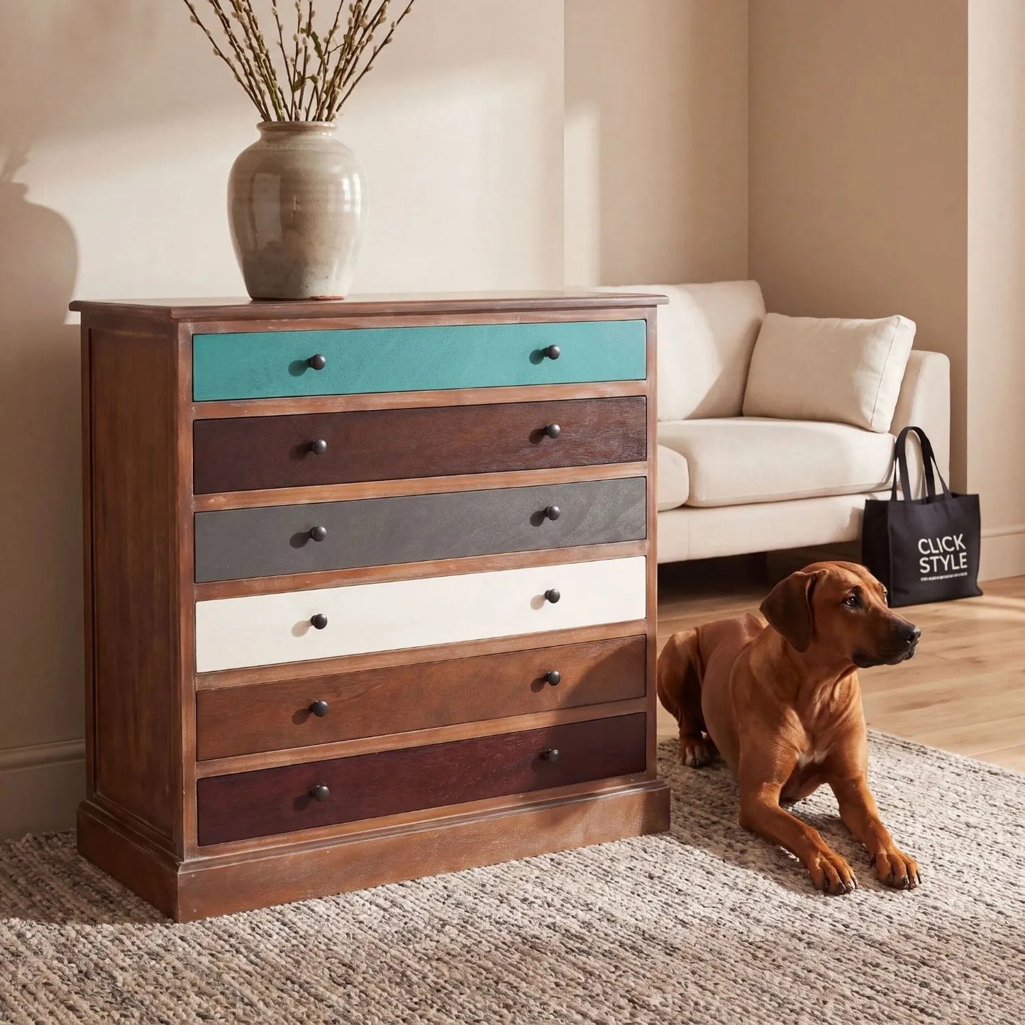Turquoise blue and neutral distressed pine wood 6 drawer chest with black knob handles styled in a living room with Rhodesian Ridgeback | Click Style
