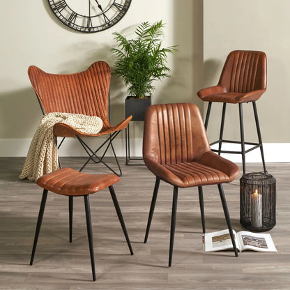 Vintage brown genuine leather dining chair with channel-stitched ribbed upholstery and interchangeable black and bronze metal legs | Click Style
