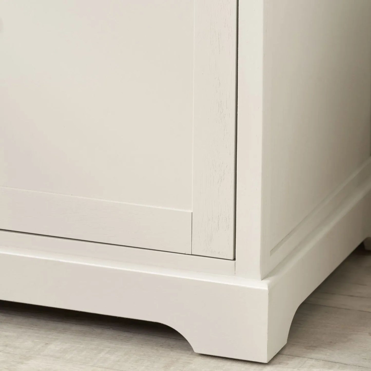 Warm Ivory Pine Wood 3 Door 3 Drawer Sideboard close-up showing bottom right plinth and curved corner detail 75x120x35cm | Click Style