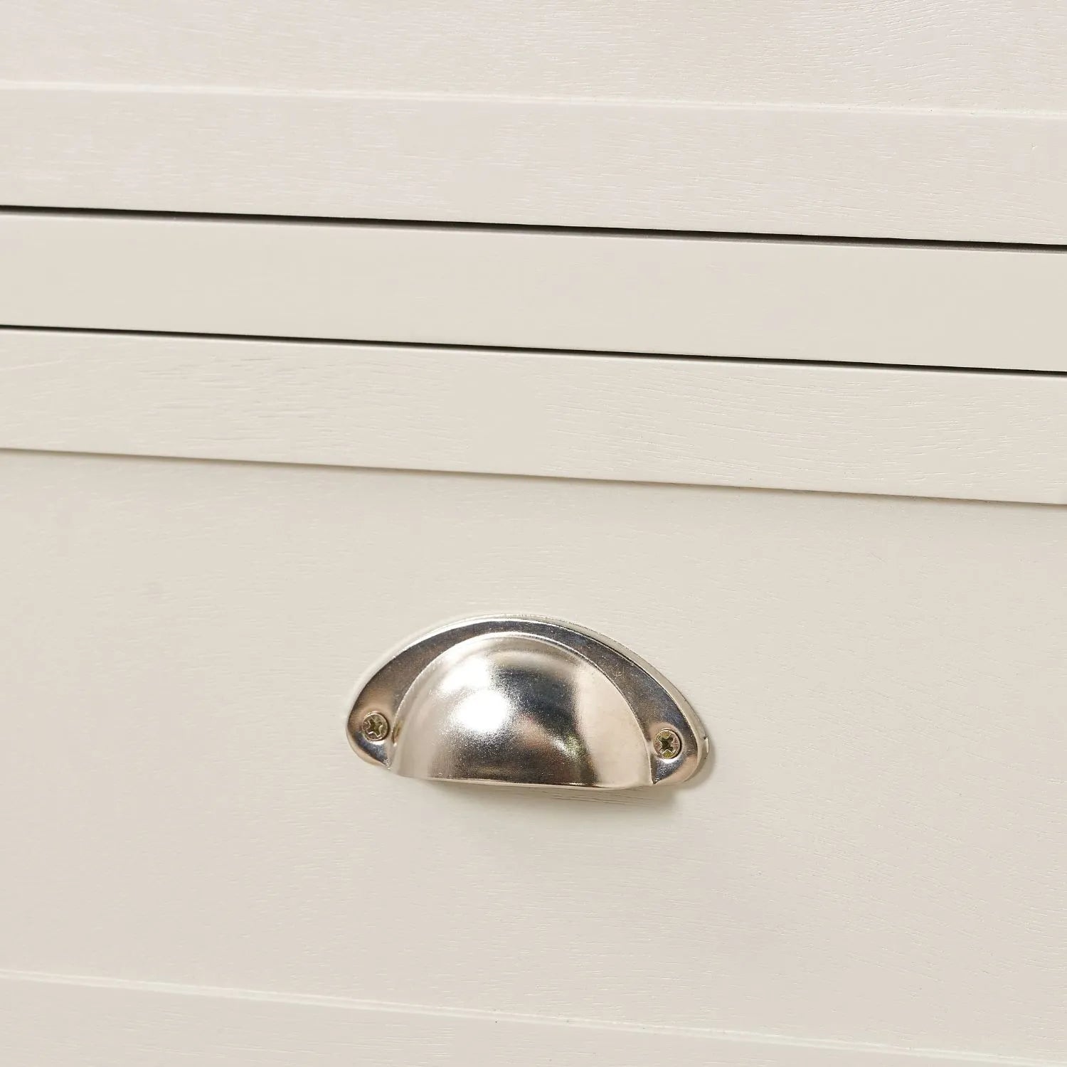 Warm Ivory Pine Wood 5 Drawer Tall Boy Chest of Drawers with Polished Silver Cup Handles close-up of another polished silver cup handle 108x41x33cm | Click Style