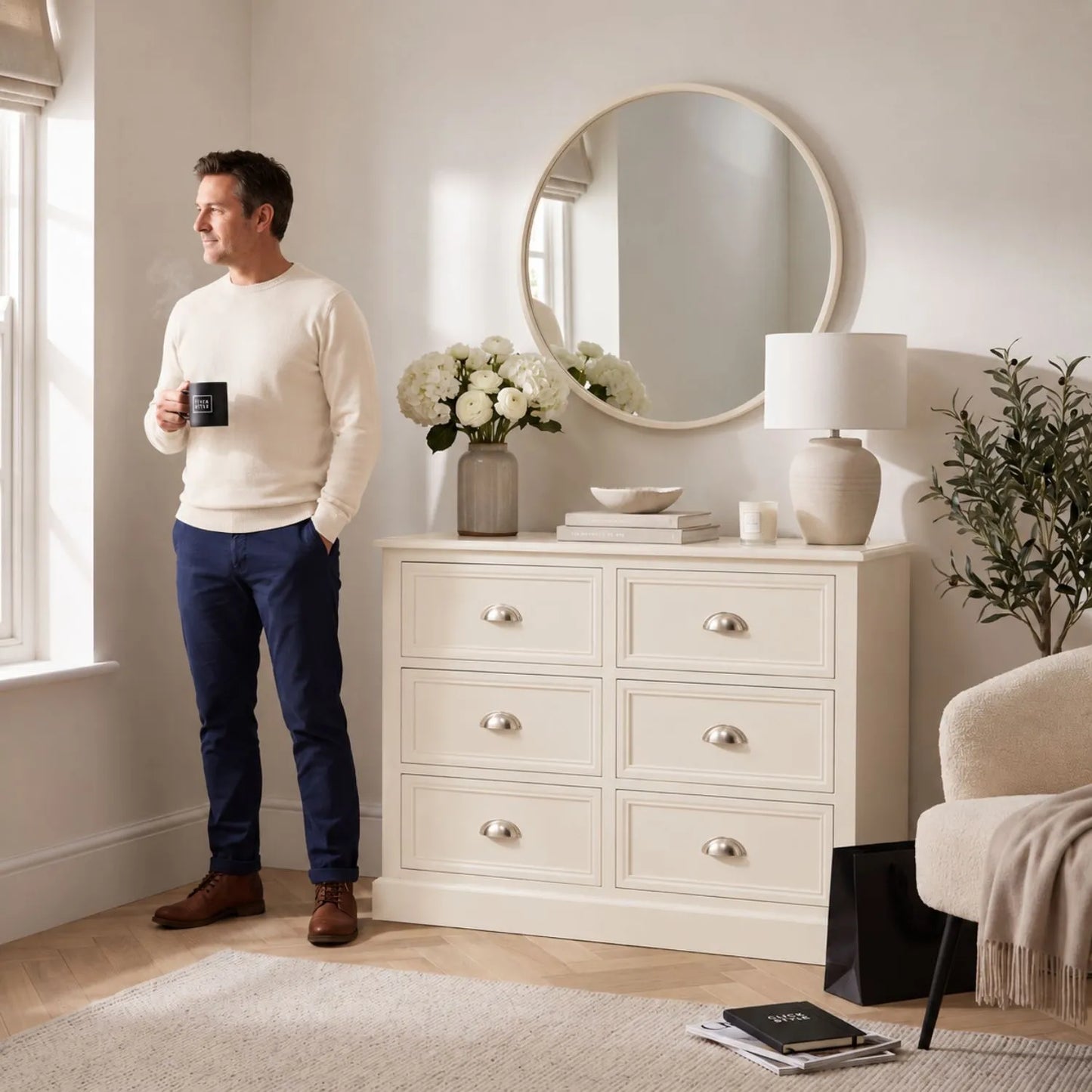 Warm Ivory Pine Wood 6 Drawer Chest of Drawers with Polished Silver Cup Handles styled in a neutral home with man holding Click Style mug 70x76x33cm | Click Style