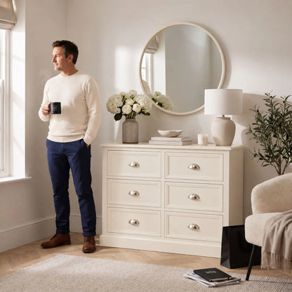 Warm Ivory Pine Wood 6 Drawer Chest of Drawers with Polished Silver Cup Handles styled in a neutral home with man holding Click Style mug 70x76x33cm | Click Style