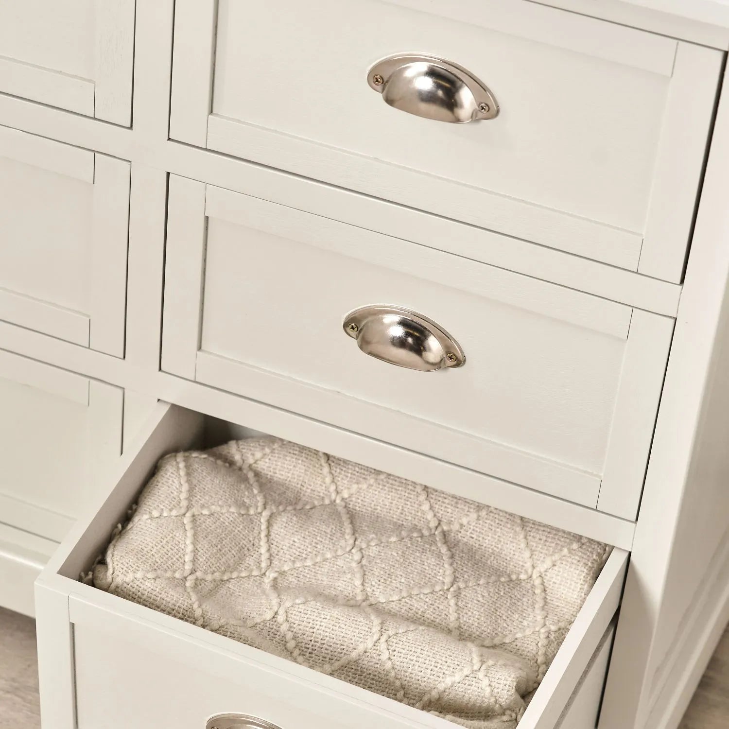 Warm Ivory Pine Wood 6 Drawer Chest of Drawers lifestyle view with bottom right drawer open and cream throw inside 70x76x33cm | Click Style