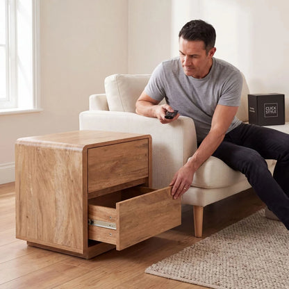 Warm Natural Oak Effect Side Table & Bedside Table with 2 Handleless Drawers used by man beside a neutral armchair in a living room | Click Style